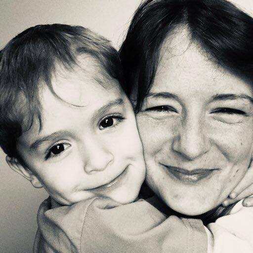 Nikki cheek to cheek with her son